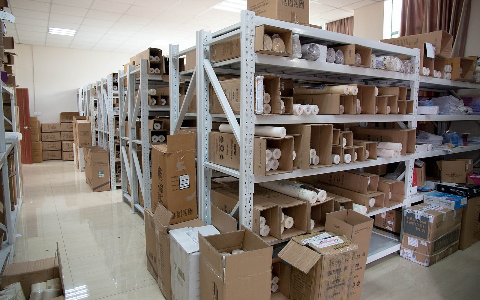 Industrial warehouse shelves used for parts sourcing and procurement